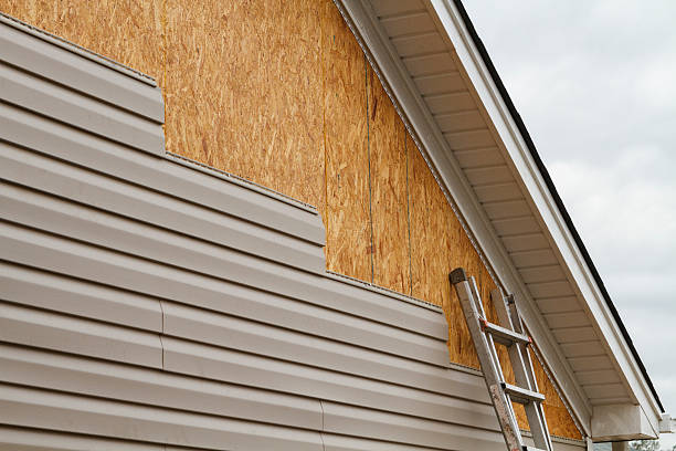 Professional Siding technician working in Free Union, VA